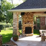 Enjoy your backyard year-round with an outdoor fireplace.